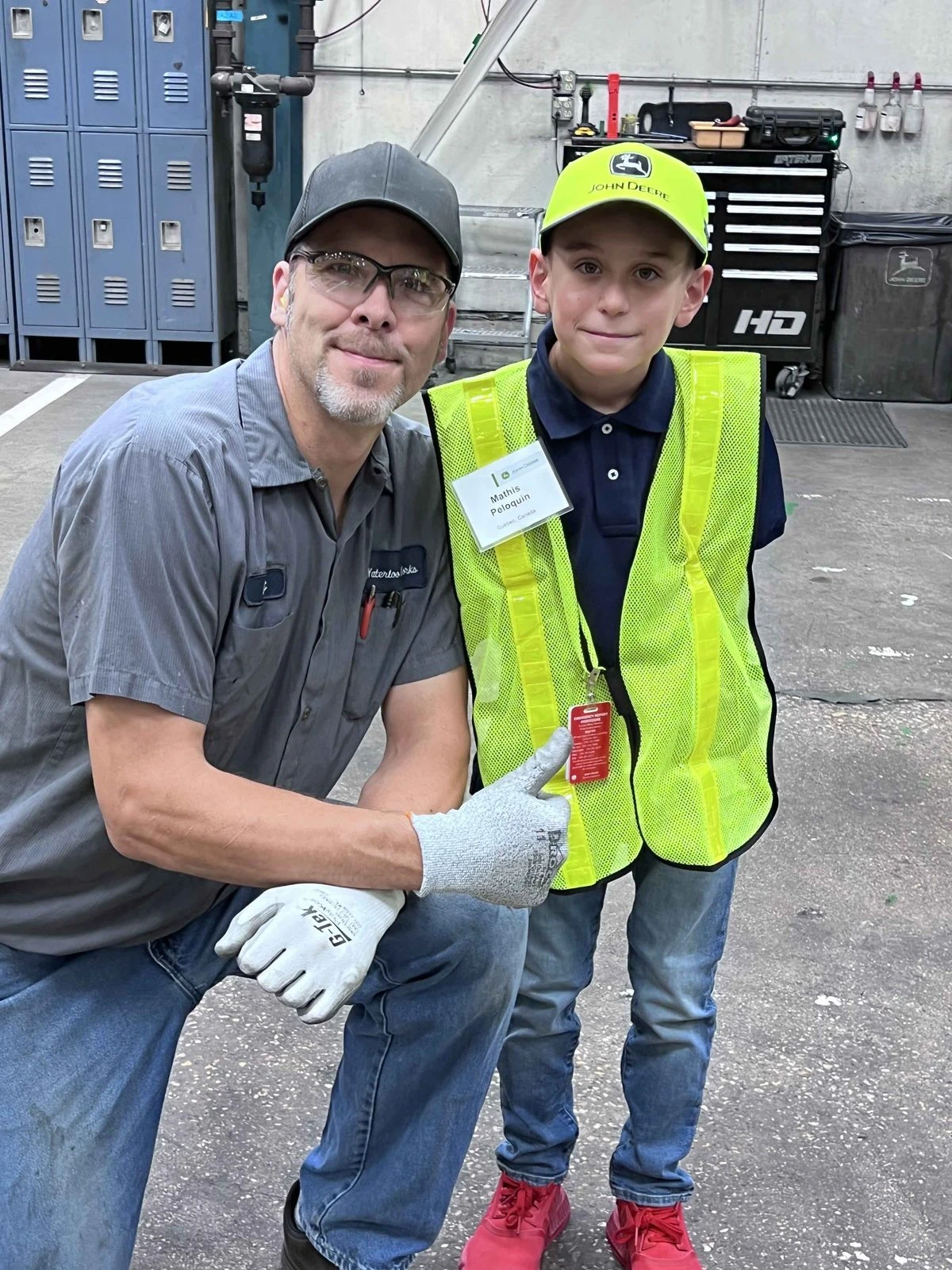 New friends made on the factory floor during a Make-A-Wish visit